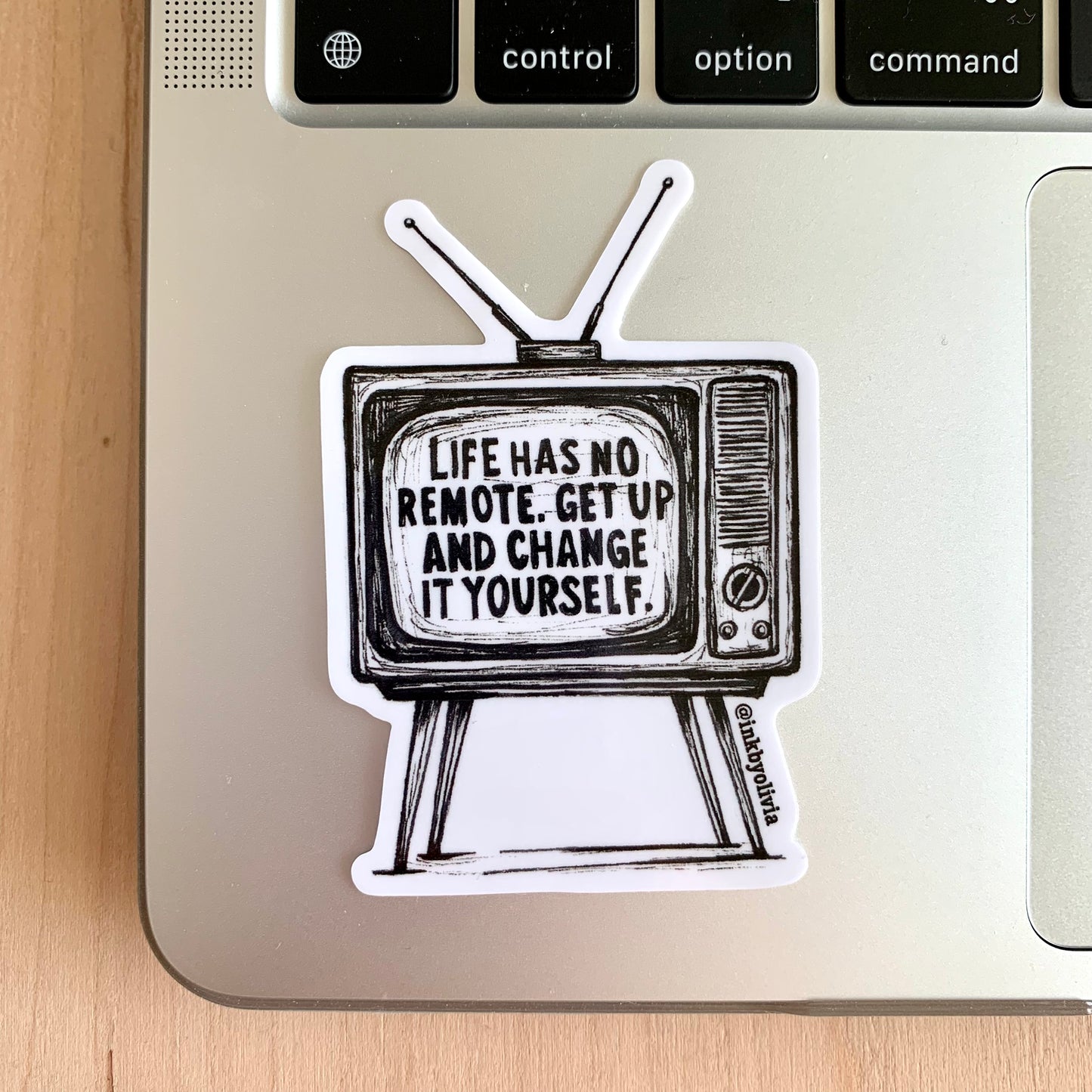 Vintage TV with a message that says 'Life has no remote, get up and change it yourself.' Retro design with a motivational twist.