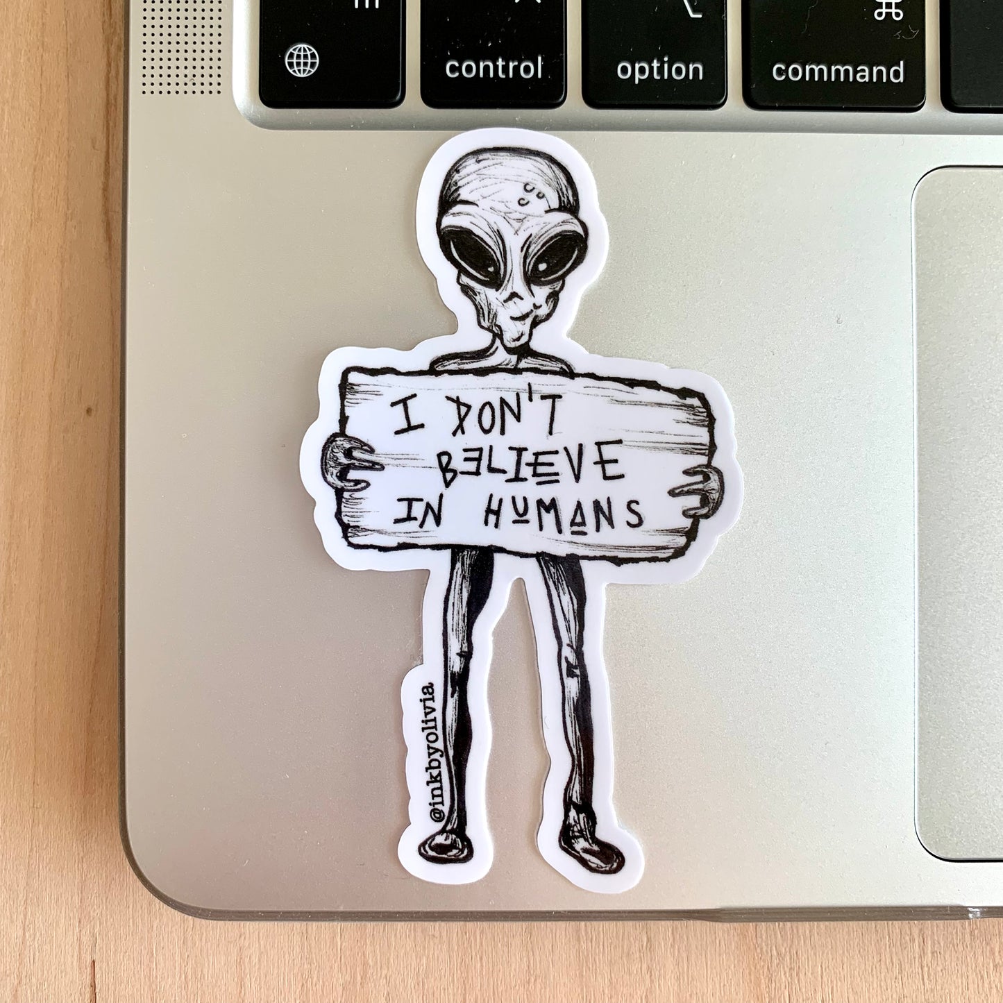 Alien with a humorous 'I Don’t Believe in Humans' quote, fun and quirky design.