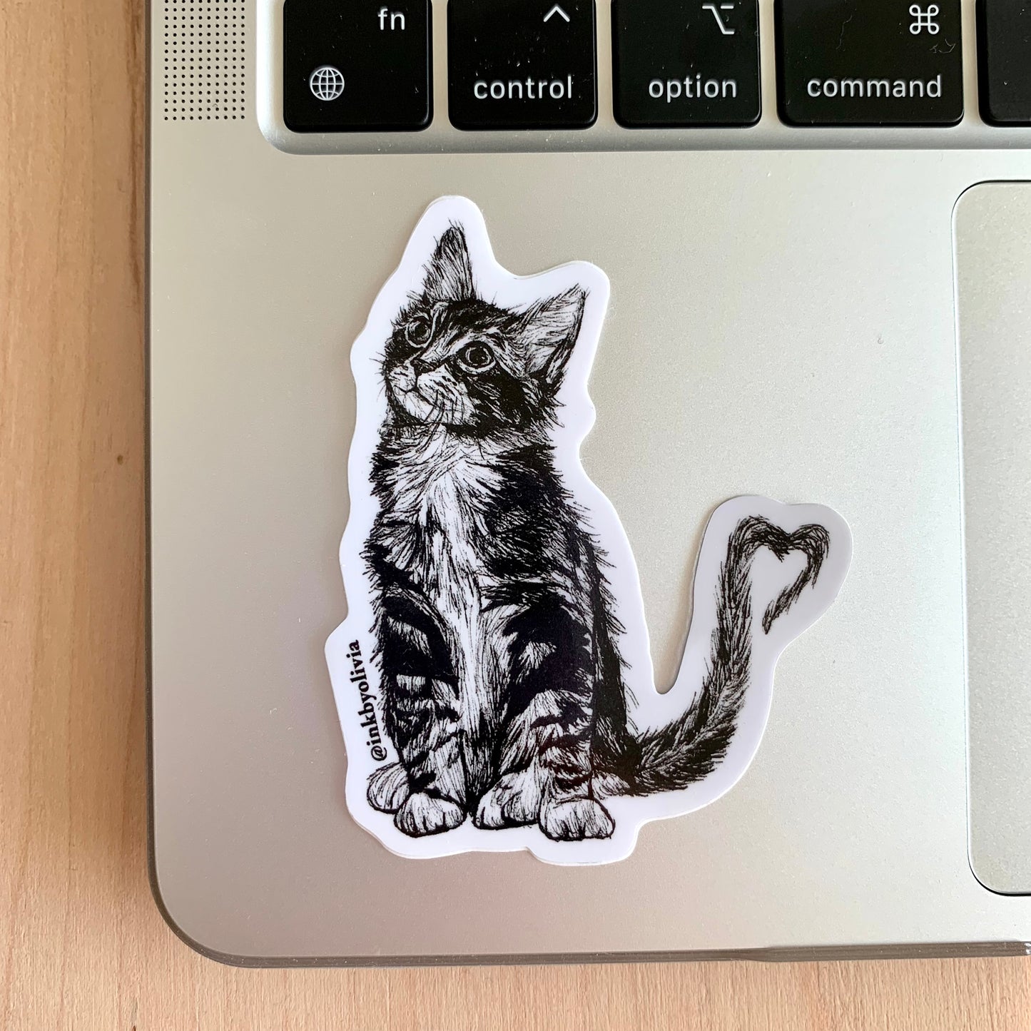 Cute cat with a heart-shaped tail, simple and playful design.